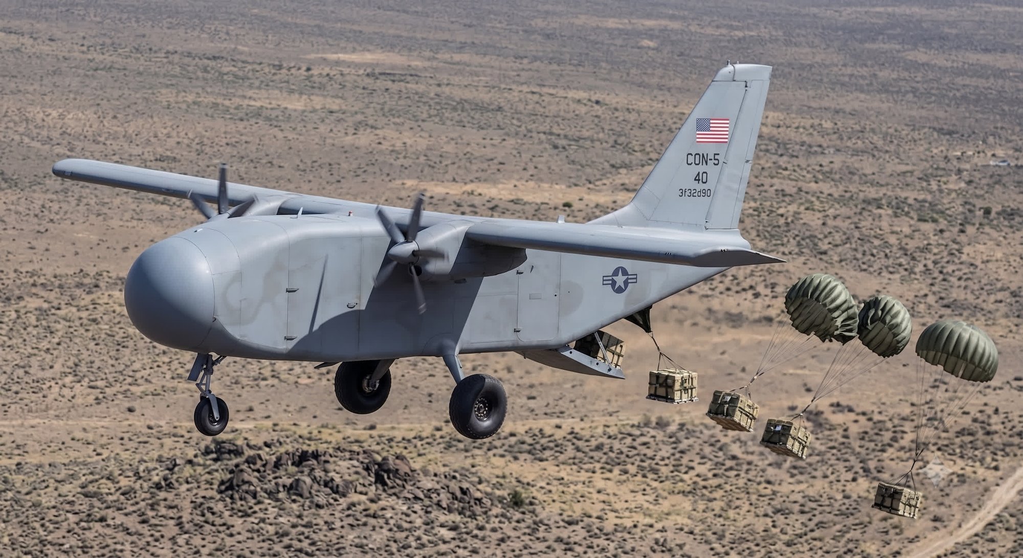 Condor airdropping cargo over desert terrain